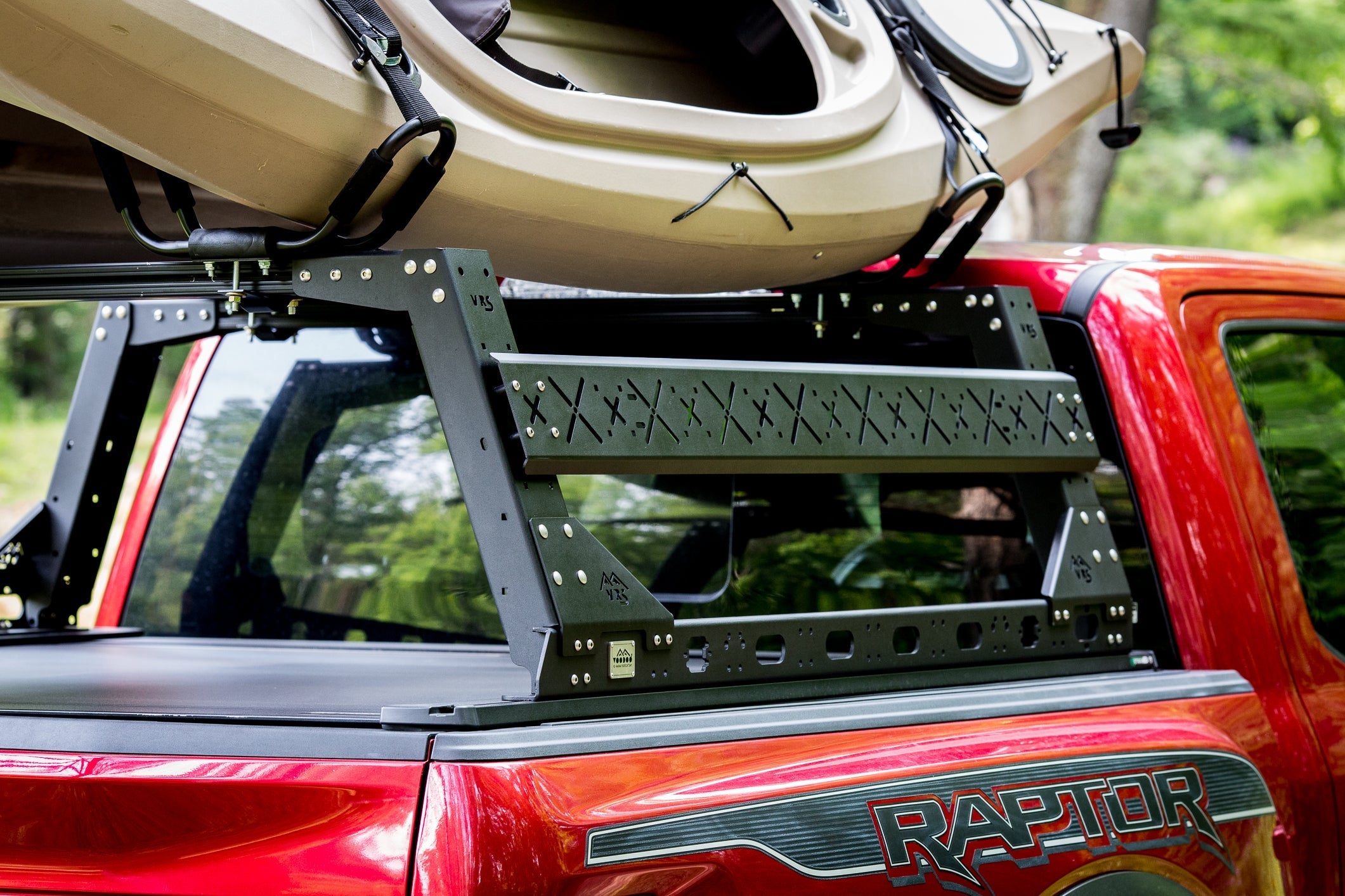 KB Voodoo VRS 18 inch overland bed rack with kayak loaded on red Ford F-150 Raptor