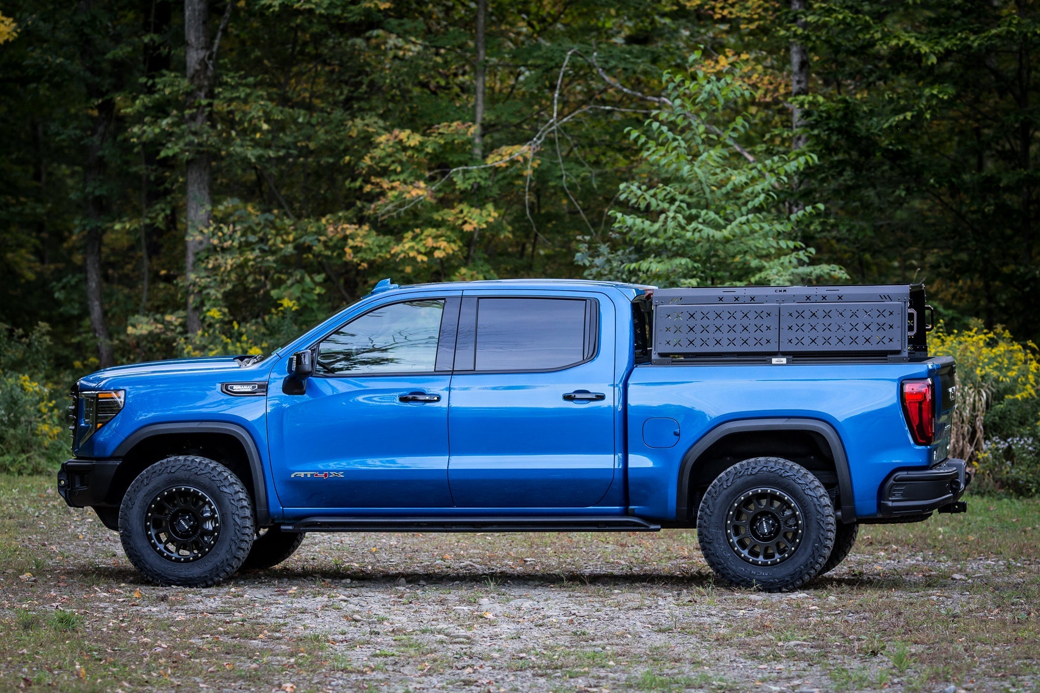 GMC Sierra AT4X with a KB Voodoo CXR bed rack installed, side profile view