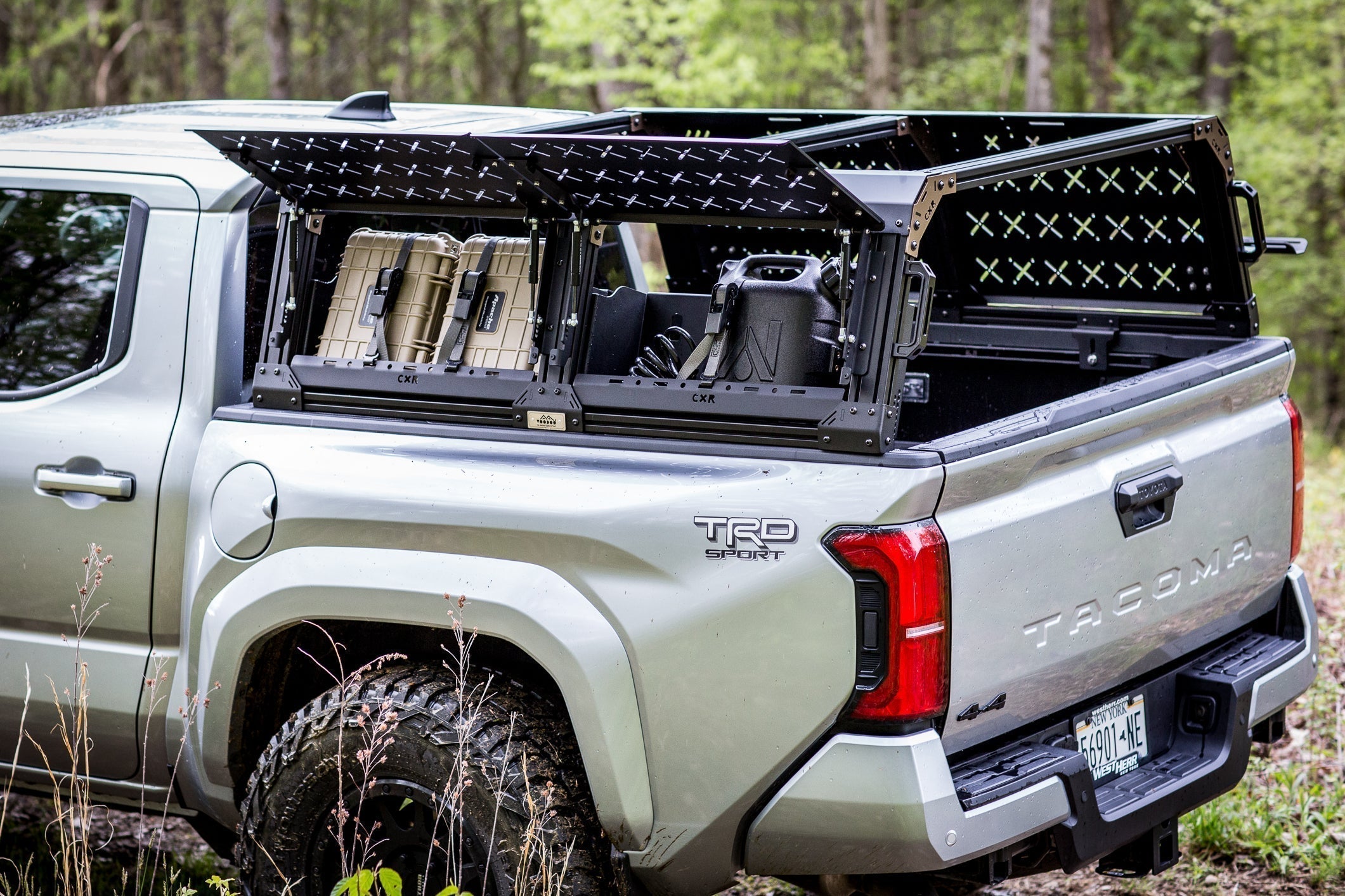 KB Voodoo CXR Fortress 6-Pack overland bed rack with Cargo Access Doors open on silver Toyota Tacoma TRD Sport