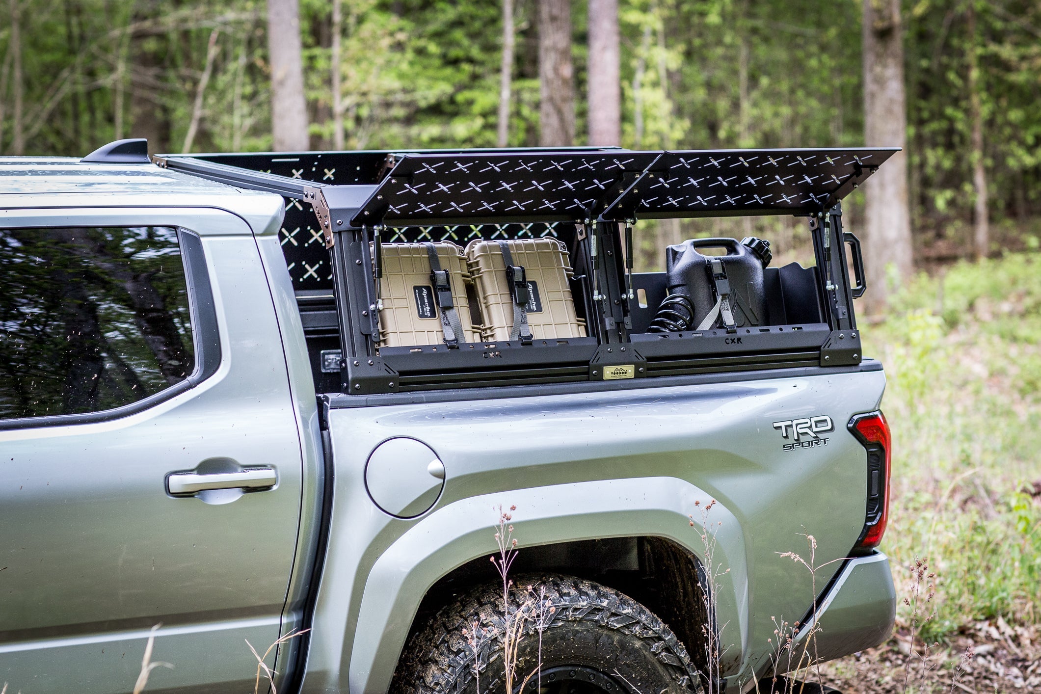 Toyota Tacoma with KB Voodoo CXR overland truck bed rack and cargo storage accessories