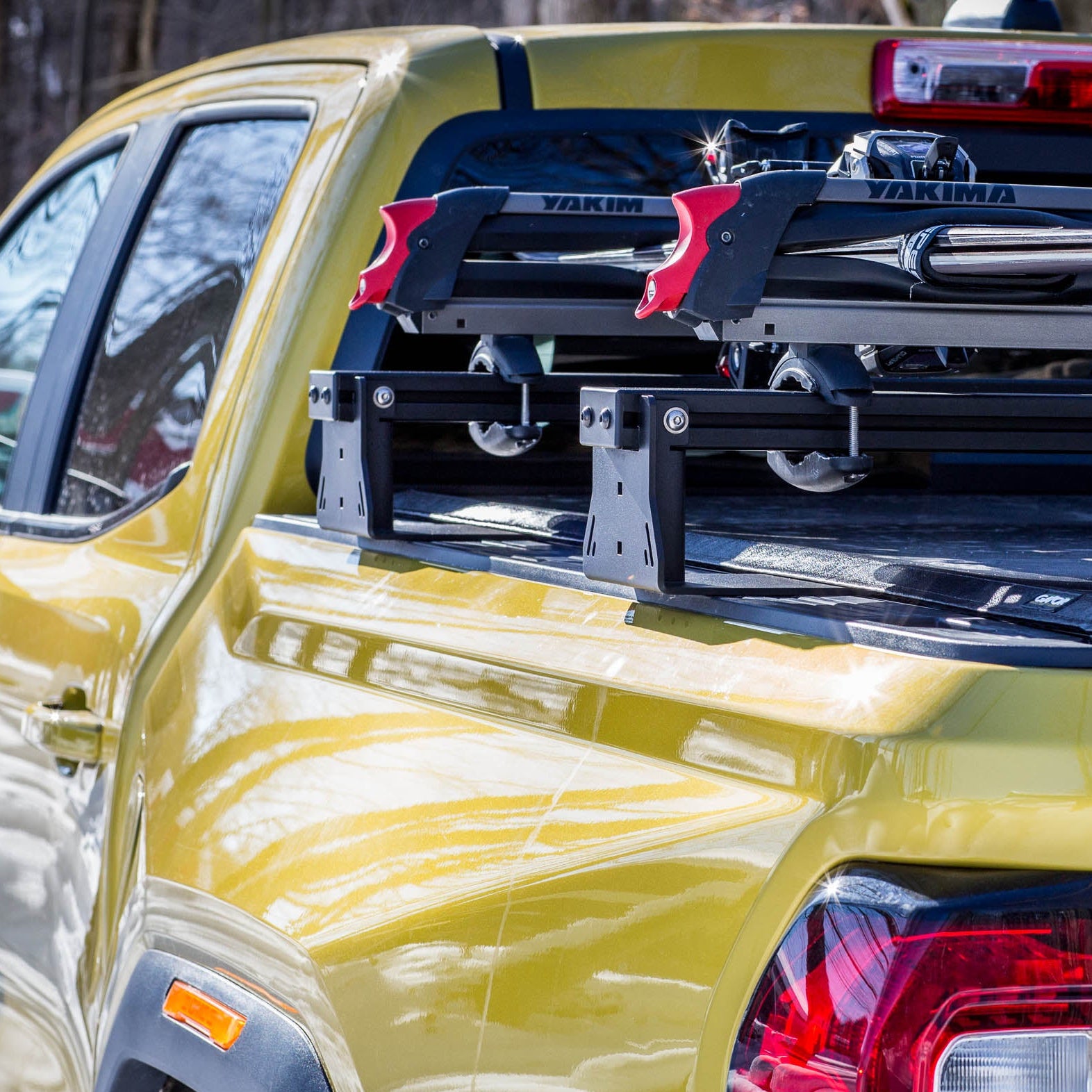 Yellow truck with a ski rack on the roof