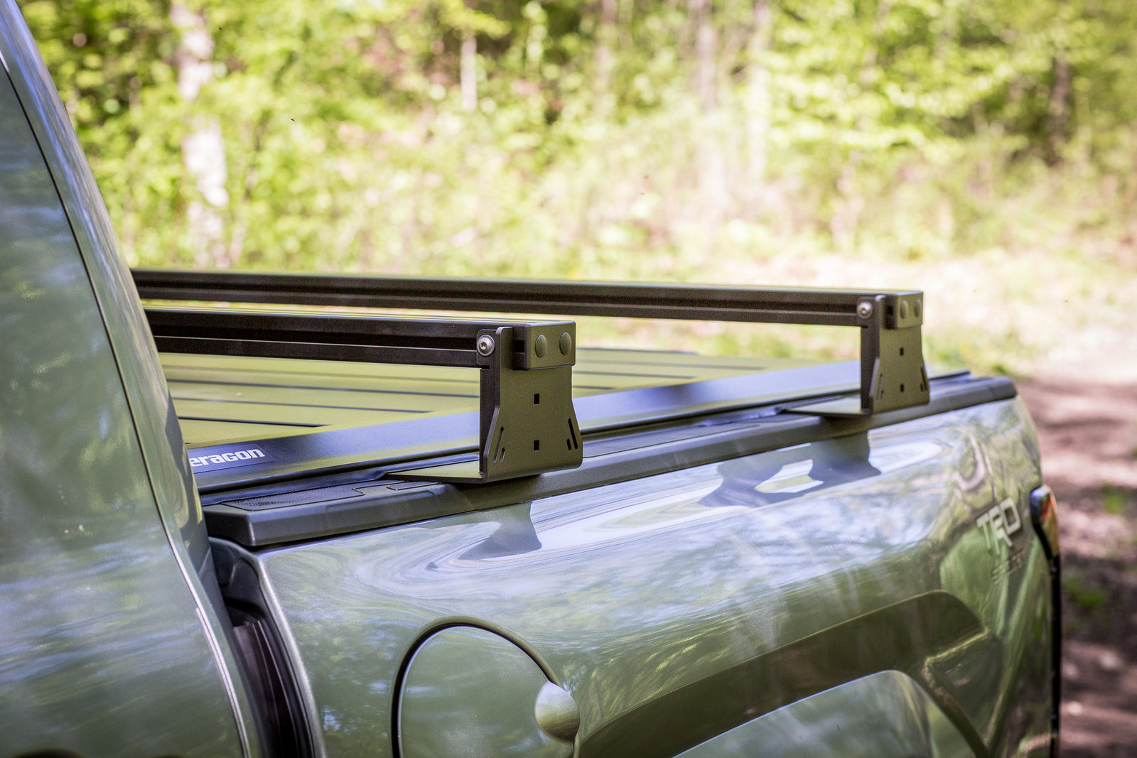 Roof rack on a vehicle with a forest background