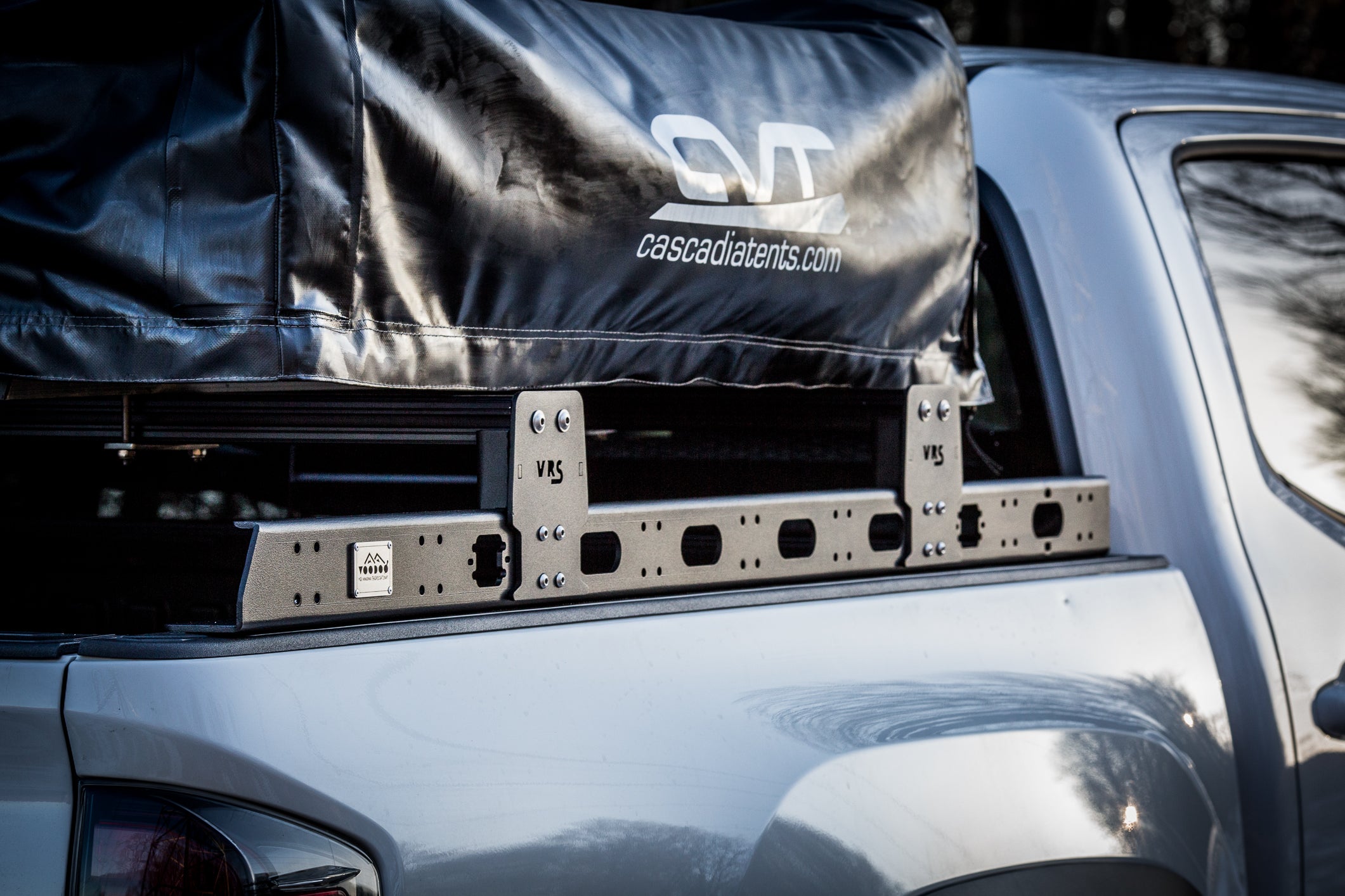 Truck bed rack with rooftop tent